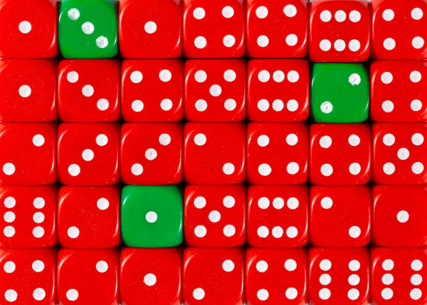 istock Background of random ordered red dices with three green cubes 1136147921
