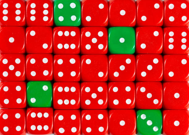 istock Background of random ordered red dices with four green cubes 1136147925
