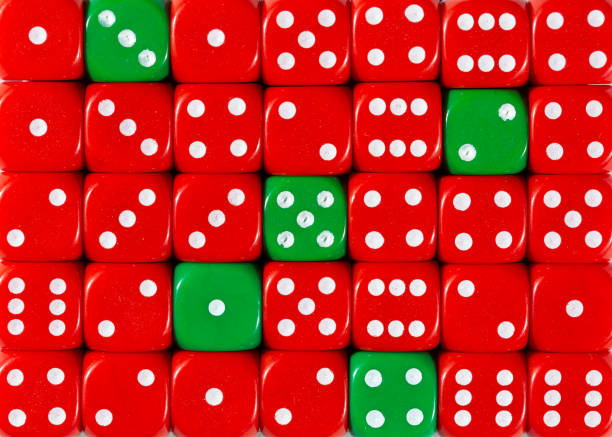 istock Background of random ordered red dices with five green cubes 1136147934