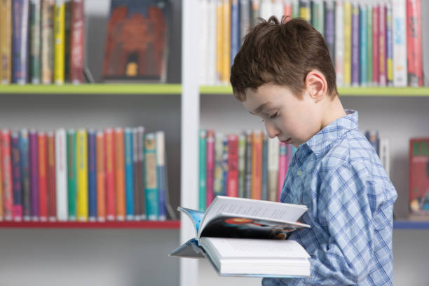 istock The boy plays and teaches in a beautiful modern library 1136149407