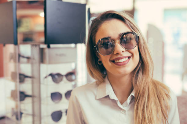 istock woman in optci store 1136149545