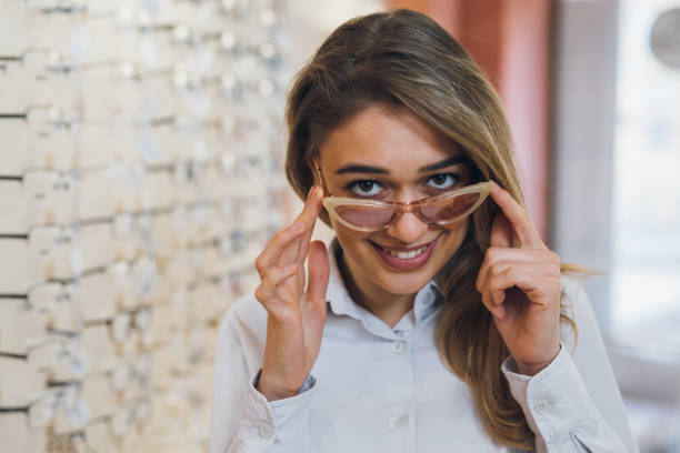istock woman in optci store 1136150720