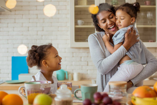 istock Tender kid leaning on her young mommy 1136159543