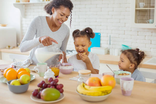 istock Attractive brunette female communicating with her kids 1136159617