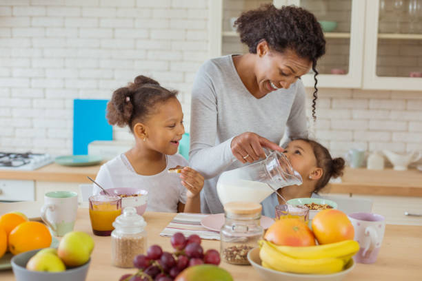 istock Positive delighted young woman looking at her child 1136159628