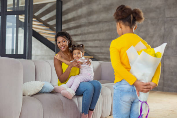 istock Emotional young woman looking forward at her child 1136161589