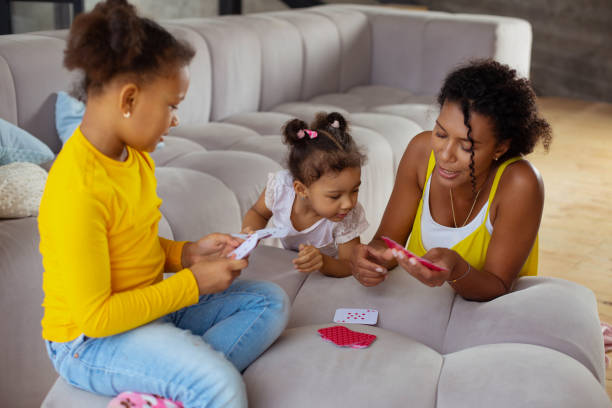 istock Concentrated female person leaning elbows on sofa 1136161602