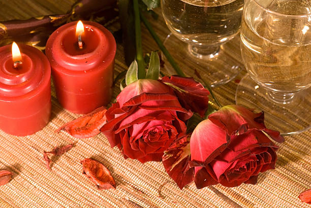 istock scarlet sweetheart rose and champagne 113616270