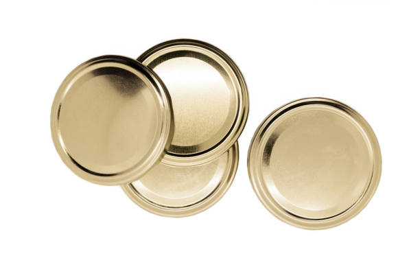 fotografii de stoc, fotografii și imagini scutite de redevențe cu capace de borcan auriu izolate pe fond alb - capac