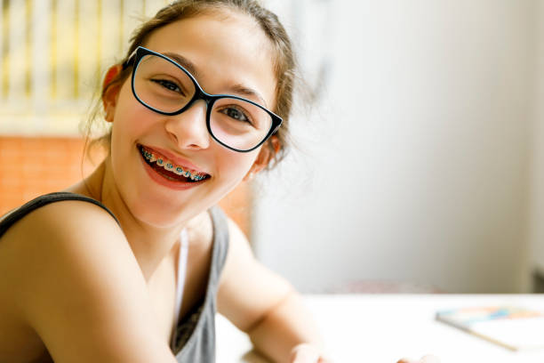 istock Teenager girl doing homework 1136165945