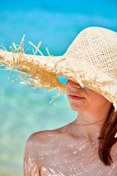 istock Woman in bikini on beach 1136167214