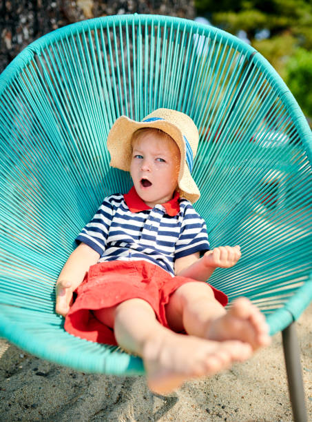 istock Toddler boy in beach chair 1136167235