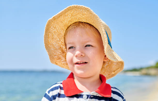 istock Toddler boy on beach 1136167259