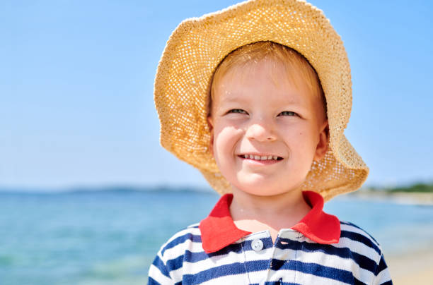 istock Toddler boy on beach 1136167272