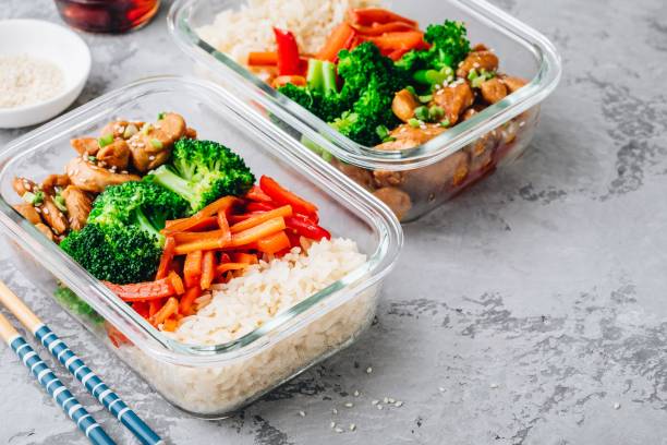 Chicken teriyaki meal prep lunch box containers with broccoli, rice and carrots Chicken teriyaki stir fry meal prep lunch box containers with broccoli, rice and carrots quinoa photos stock pictures, royalty-free photos & images