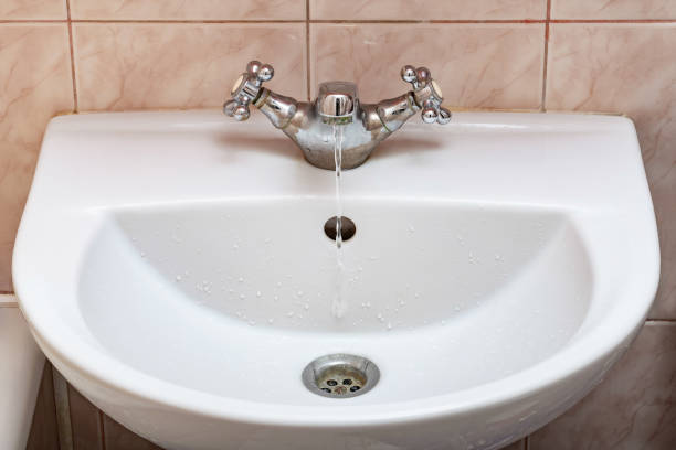 istock Tap with Water Flowing Slowly 1136172236