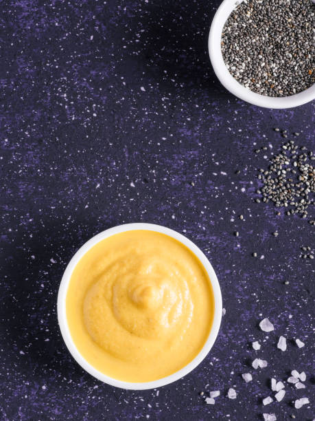 Vegan creamy cheddar cheese sauce with chia seeds