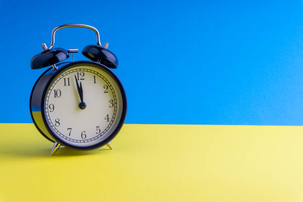 istock Alarm Clock on colorful background with selective focus 1136175097