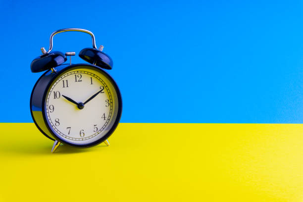 istock Alarm Clock on colorful background with selective focus 1136175106