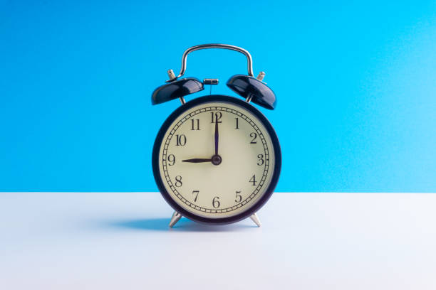 istock Alarm Clock on colorful background with selective focus 1136175160