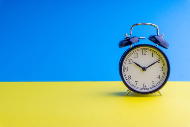 istock Alarm Clock on colorful background with selective focus 1136175234