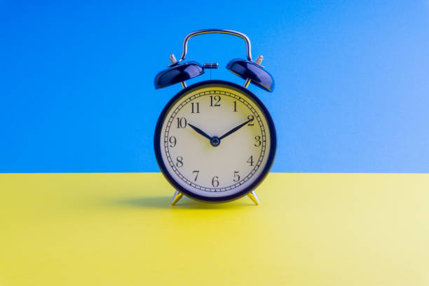 istock Alarm Clock on colorful background with selective focus 1136175272