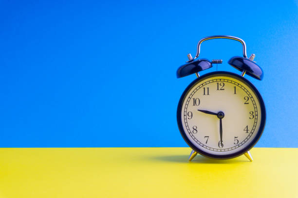 istock Alarm Clock on colorful background with selective focus 1136175277