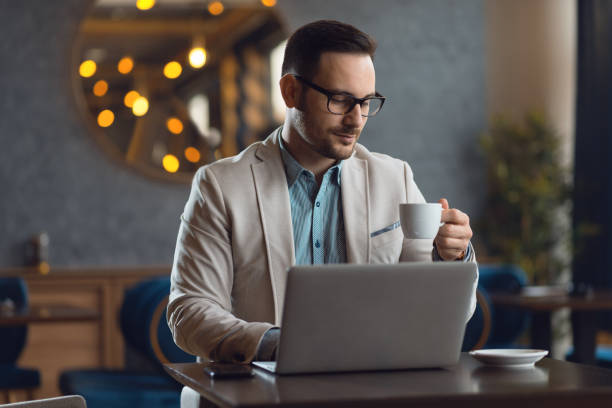 istock Pensive businessman on a coffee break in a cafe 1136175973