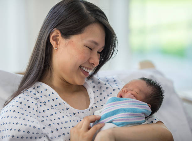 istock Mother And Baby In Bed 1136176258