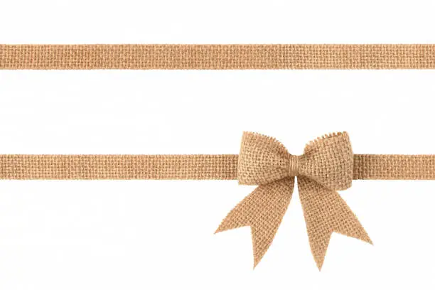 Burlap ribbon bow for gift decoration isolated on white background