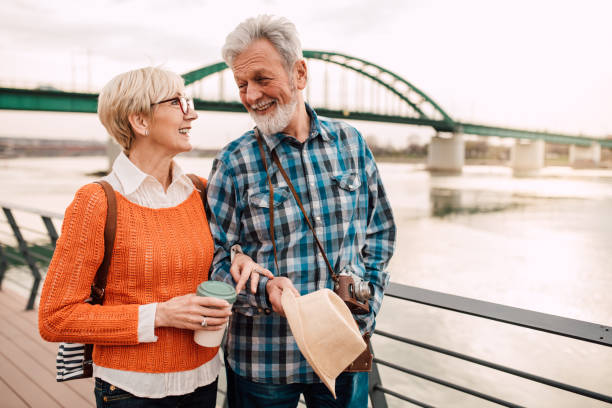 Couple walking by the river