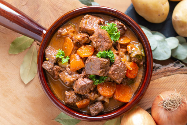 Food concept french classic beefs stew estouffade de boeuf with copy space Food concept french classic beefs stew estouffade de boeuf with copy space stew photos stock pictures, royalty-free photos & images