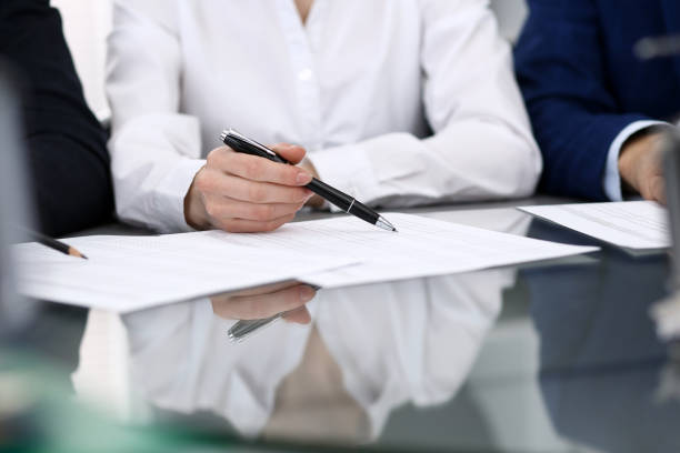 Bookkeepers team or financial inspectors  making report, calculating or checking balance. Group of people at work. Business operations concept.