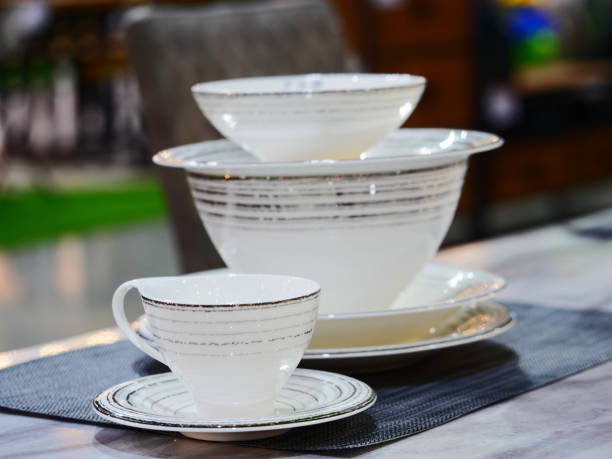 istock White dinner plates, bowls, cups, and glasses 1136185179