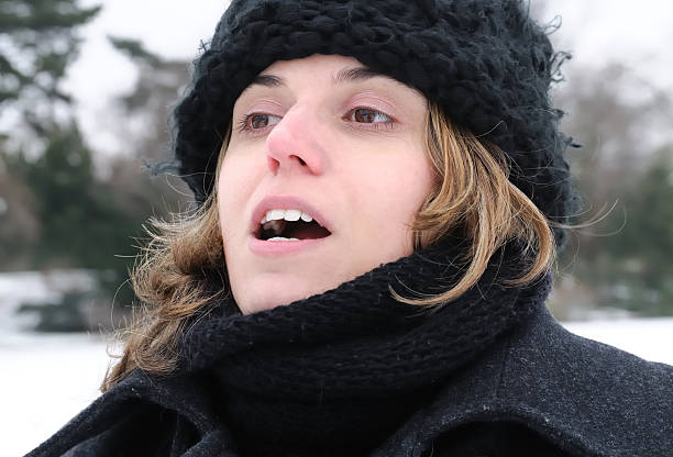 istock young woman in Snow 113618630