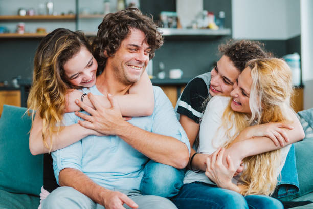 istock Family with teenagers having fun 1136186367
