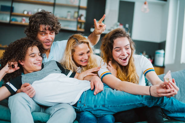 istock Happy family taking a selfie 1136186368