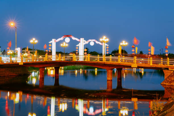 istock Ancient Bridge above River in Hoi An night 1136186825