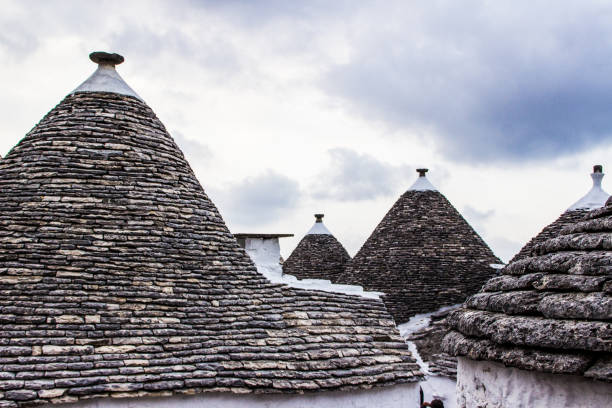 Trulli of Albero Bello Ancient city of Albero Bello Famous for its characteristic dwellings called trulli which since 1996 are protected by UNESCO as a World Heritage Site, is part of the Valle d'Itria and the Murgia dei Trulli, PUGLIA albero stock pictures, royalty-free photos & images