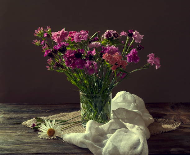 istock Still life with carnation flowers 1136186999