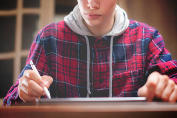 istock young male artist draw on digital tablet in studio 1136190119