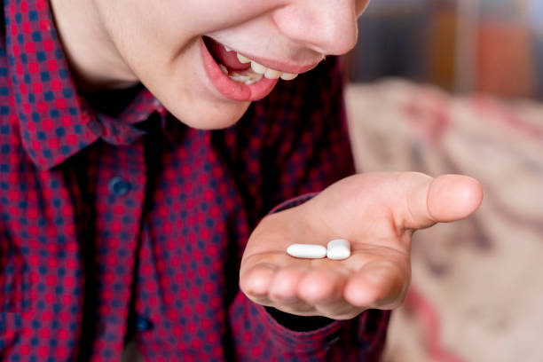 istock person eat chewing gum close up b 1136191230