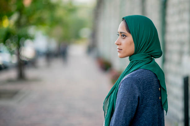 istock Muslim Woman Downtown 1136193194