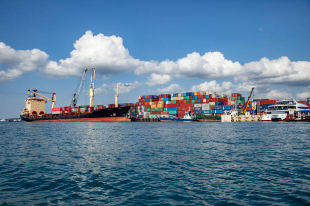 istock Cargo Ship in the Commercial Dock loading Shipping Containers 1136195200