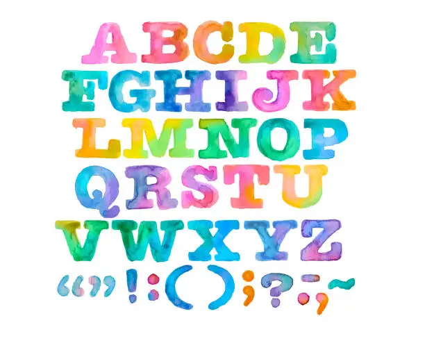 Photo of Brightly Painted Watercolor Alphabet and Punctuation