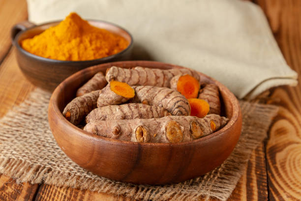 istock Close turmeric roots and powder 1136198532
