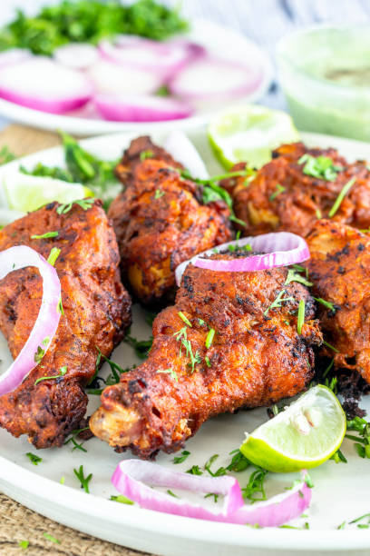 istock Indian Style Fried Chicken Drumsticks - Vertical Photo 1136202422
