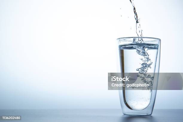 https://media.istockphoto.com/id/1136202480/photo/dipping-water-into-a-double-glass-close-up.jpg?s=612x612&w=is&k=20&c=TIZZs6z9zV9qVX83b8-TnHoh9vjKlVCwhrQHLf0hGgE=
