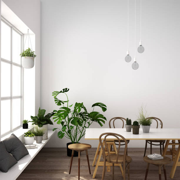 istock 3d illustration,interior design for dining area or working table in modern style with chair, table,plant on wood floor and white concrete wall 1136203153