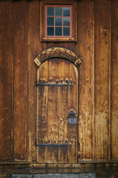 Fish eye view of a historic church with antique wooden door
